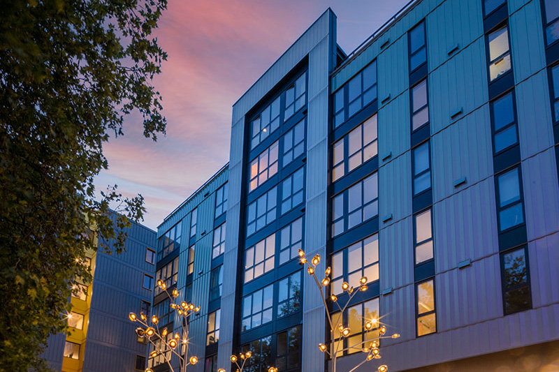 Center Steps Apartments, from the right, features the channel glass facade
